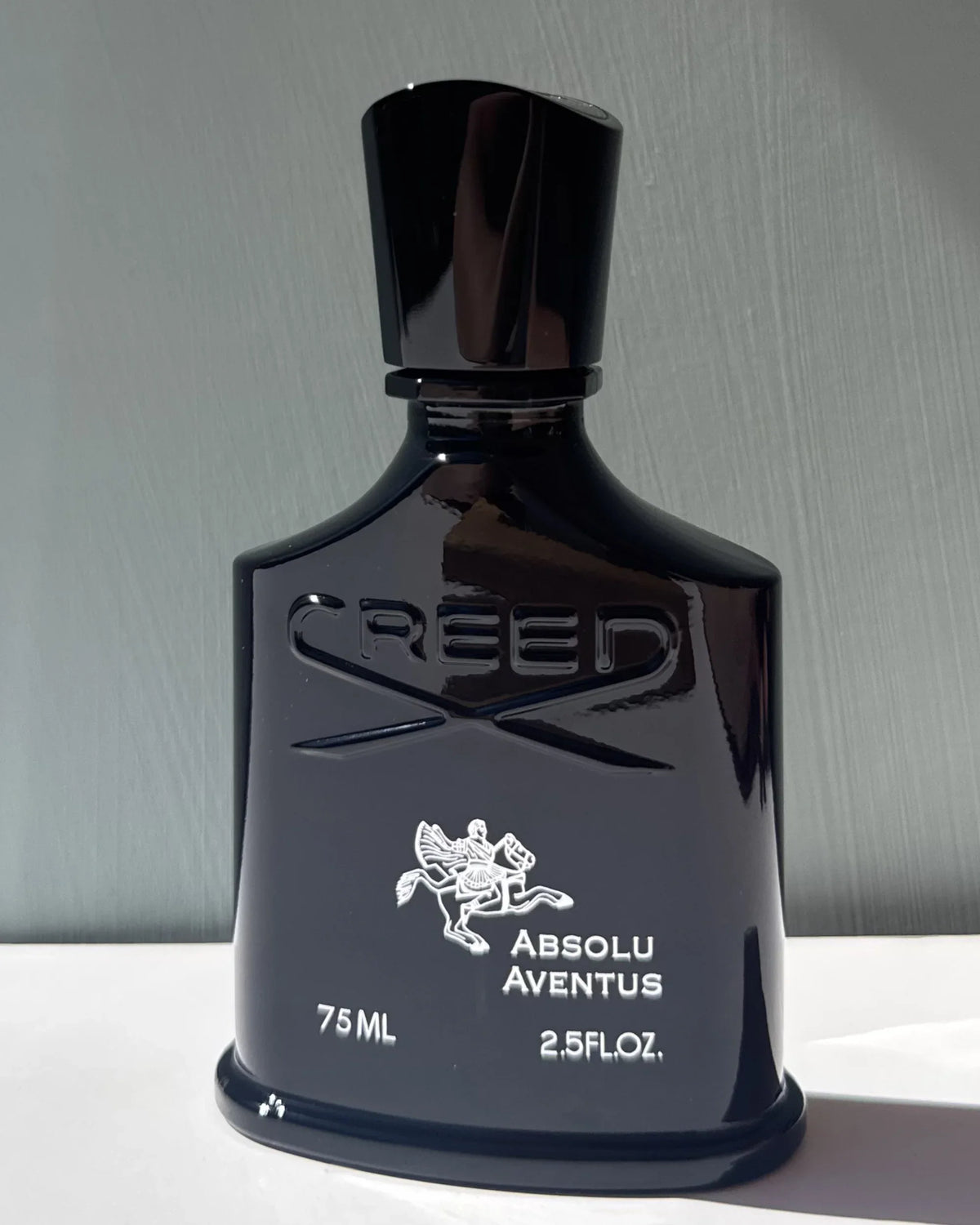 Creed Absolu Aventus fragrance decant bottle